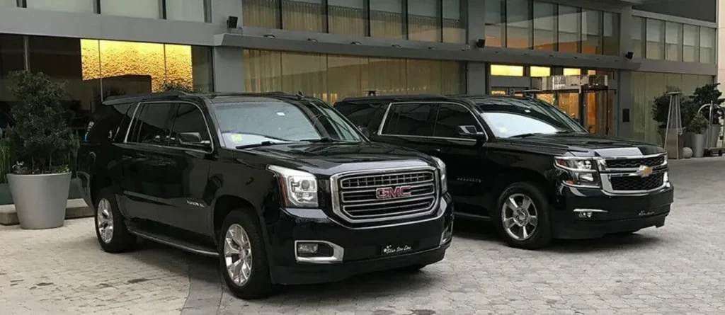 Black luxury SUVs providing the cheapest private shuttle from IAH to Galveston for cruise passengers.