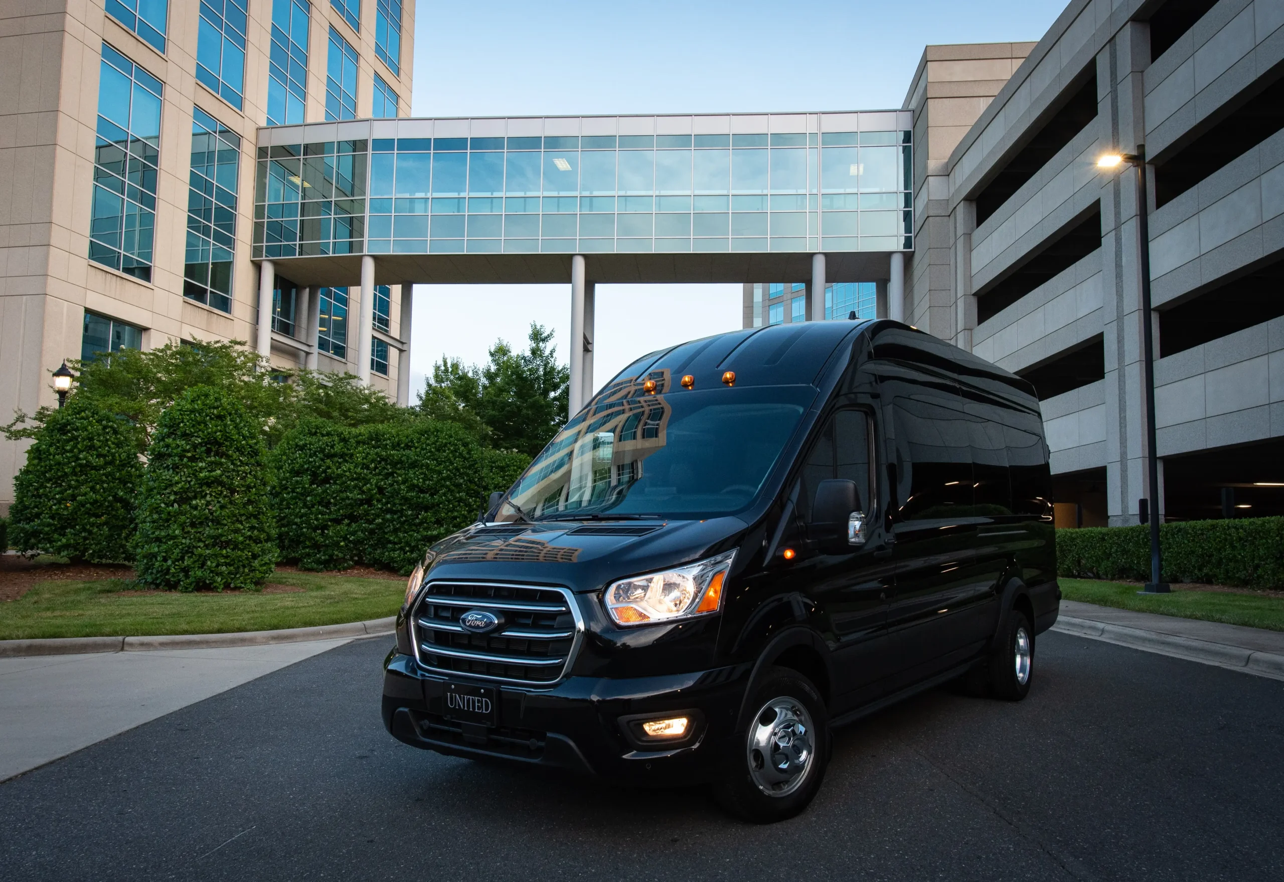 Large luxury passenger shuttle bus service across Texas cities